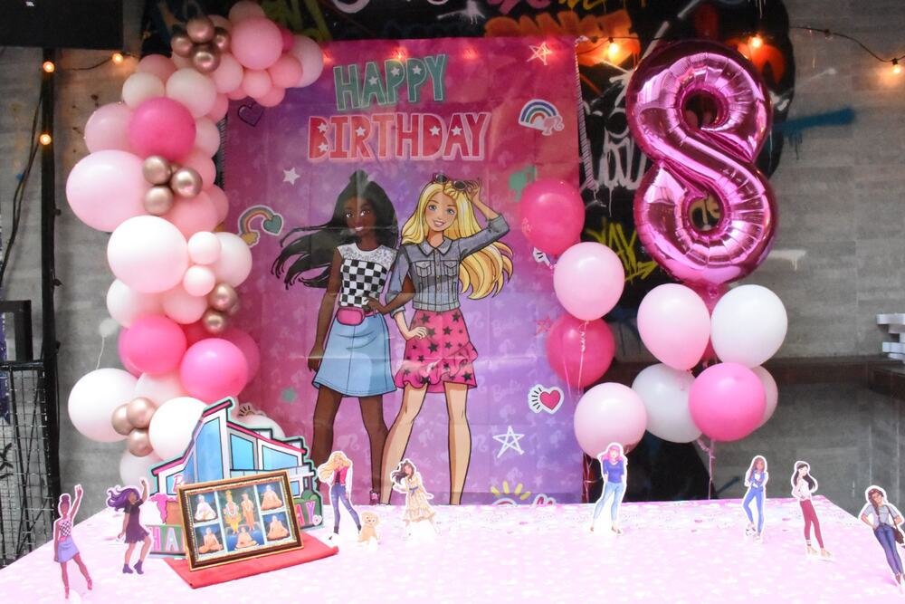 Themed birthday party setup with balloons