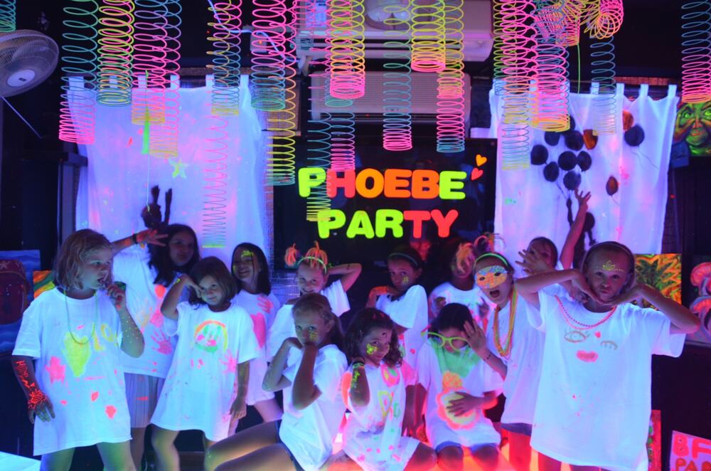 Kids party group photo under UV light